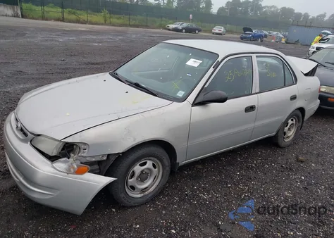 2000 Toyota Corolla Ve z USA, uszkodzony, nr VIN 2T1BR12E3YC284075